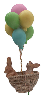 Helium balloon travel bunnies going for a ride in a basket mg428