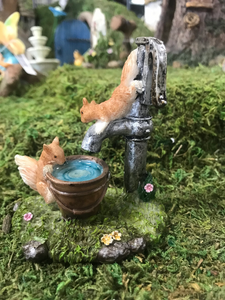 Fairy Garden Squirrels playing on a Pump Well