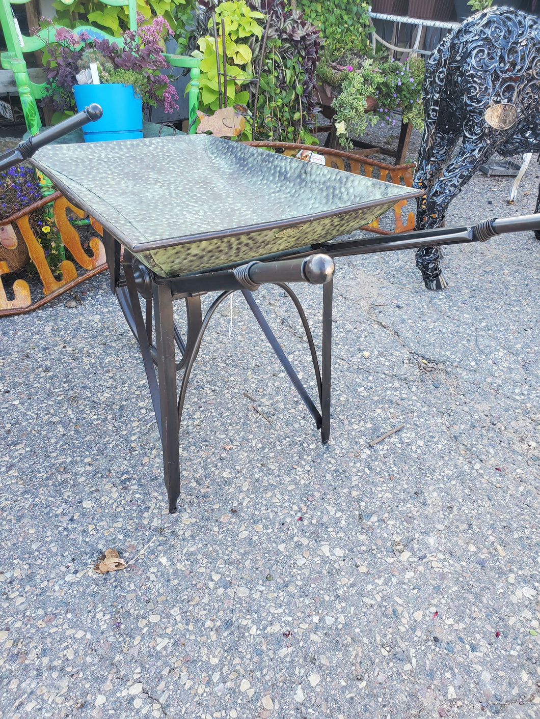 Green Metal Wheel Barrow with Hammered Metal Design