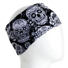 Load image into Gallery viewer, A WHITE MANNEQUIN HEAD IS WEARING A, 9.5 INCHES WIDE BY 19 INCHES LONG, STRETCHABLE INFINITY SCARF. THIS ONE IS A WHITE SKULLS ON A BLACK BACKGROUND MOTIF.