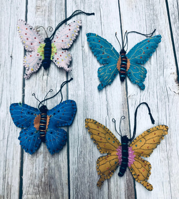 Butterfly shaped felt ornaments for seasonal and spring use. Various colors and design with lots of great detail. 