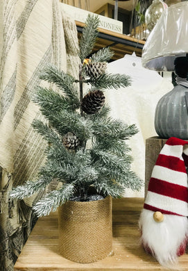 Small flocked Artificial Christmas tree with burlap wrapped pot