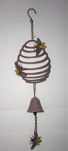 Metal Honey comb with 3 small bees attached that hangs.  There is a bell that will chime in the wind.