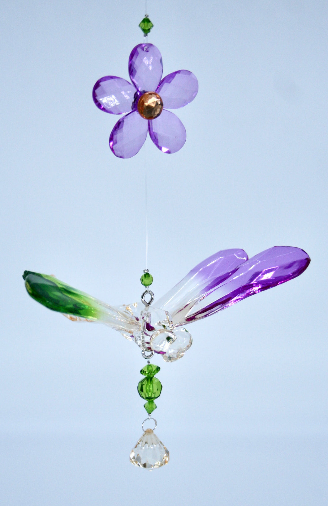 purple acrylic dragonfly that hangs with 3 long flowers