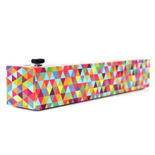 Load image into Gallery viewer, ‘CHICWRAP’ PROFESSIONAL PLASTIC WRAP DISPENSER | 12” BY 250” ROLL, BPA-FREE, PROFESSIONAL-GRADE PLASTIC WRAP IN COLORFUL DISPENSERS | 4 RUBBER FEET | PATENTED ‘ZIPSAFE’ SLIDE CUTTER | KOSHER AND HALAL CERTIFIED | MICROWAVE SAFE | REFILL WITH ANY STORE-BOUGHT PLASTIC WRAP | DISPENSER WITH MULTI-COLORED TRIANGLES.