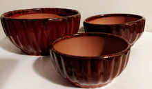 Load image into Gallery viewer, Glazed terra cotta planters for aloe, flowers or house plants.  3 sizes to choose from. Rich burgundy shallow pots for cactus.  These shallow planters have a drainage hole in the bottom.  Use indoor or outdoor.