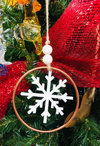 Here is an ornament that is a copper colored ring with a dangling snowflake in the center. There are two wood beads that accent this ornament with it's twine hanger. The copper and white look great together. This will be a favorite ornament for years to  come, as it is all made of metal. You could add this to your tree, wreath or add to a present. .  