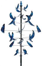 Load image into Gallery viewer, SHOWS THE TOP HALF OF THE 7 FEET TALL BLUE KINETIC WIND SPINNER THAT IS PAINTED WITH BLUE METALLIC AUTOMOBILE PAINT TO REDUCE FADING AND PEELING. IT IS METAL CONSTRUCTION WITH SOME ASSEMBLY REQUIRED. THIS WILL BE DELIVERED BY UPS GROUND.