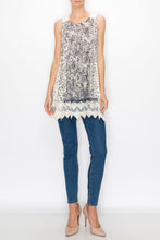 Load image into Gallery viewer, WOMAN WEARING LACE ROSE AND LEOPARD PRINT TUNIC TOP | SIZES S TO 2XL | SLEEVELESS, OVER-THE-HIP STYLE | SKINNY-LEGGED BLUE JEANS | TAN HIGH HEELS.