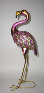 This bright pink flamingo belongs in a flock in your front yard.  Beautiful coastal bird sculptures for your garden.  Simply a beautiful piece of art 