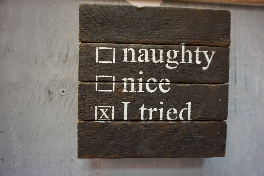 Rustic repurposed wood sign,  dark wood with off white lettering.
