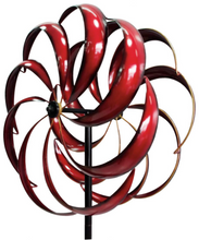 Load image into Gallery viewer, THIS WINDWARD, 6’ TALL BY 24” WIDE, KINETIC WIND SPINNER IS PAINTED WITH METALLIC AUTOMOBILE PAINT TO REDUCE FADING AND PEELING. LONG, CURVED BLADES COLORED RED WITH BLACK EDGES. THE BLADES TURN IN 2 DIFFERENT DIRECTIONS ON A BLACK POLE. IT IS METAL CONSTRUCTION WITH SOME ASSEMBLY REQUIRED. THIS WILL BE DELIVERED BY UPS GROUND.