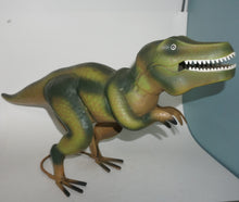 Load image into Gallery viewer, This adorable T-Rex is colorfully painted, detailed and dimensional.  He would be the cutest addition to your home and could stand guard over the garden. HIs facial expression is as charming as a dinosaur  face could be!  It&#39;s a face more than a mother could love. 